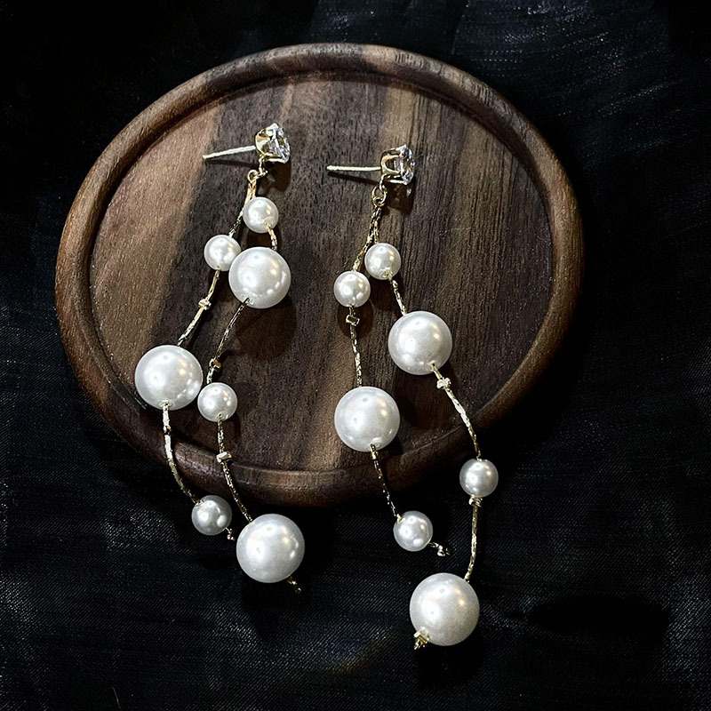 科技與時(shí)尚完美融合，最新長(zhǎng)款珍珠耳飾款式亮相！